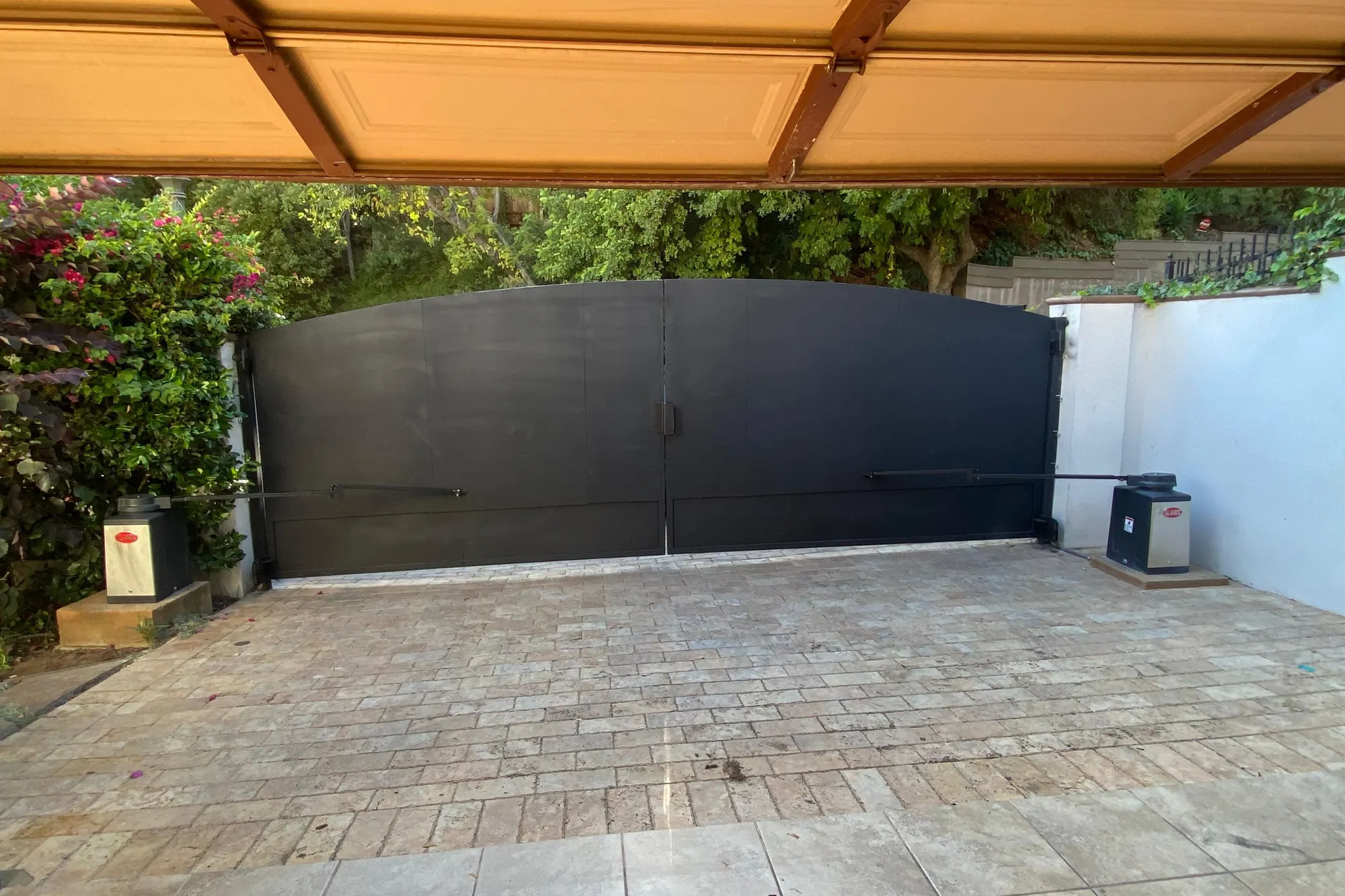 An automatic gate closing fully against its stop after adjustment