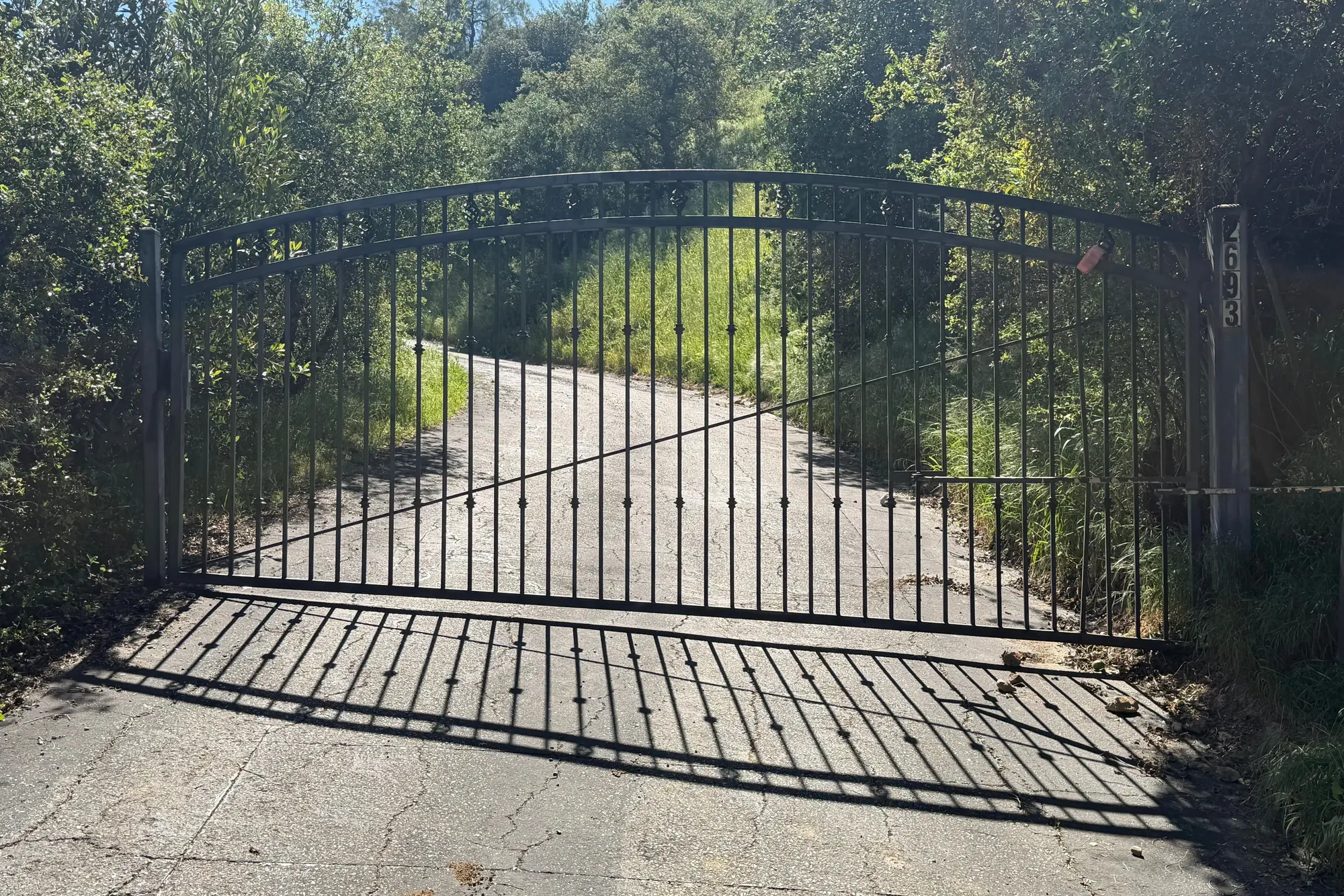 A repaired gate closing correctly under power after an emergency service visit