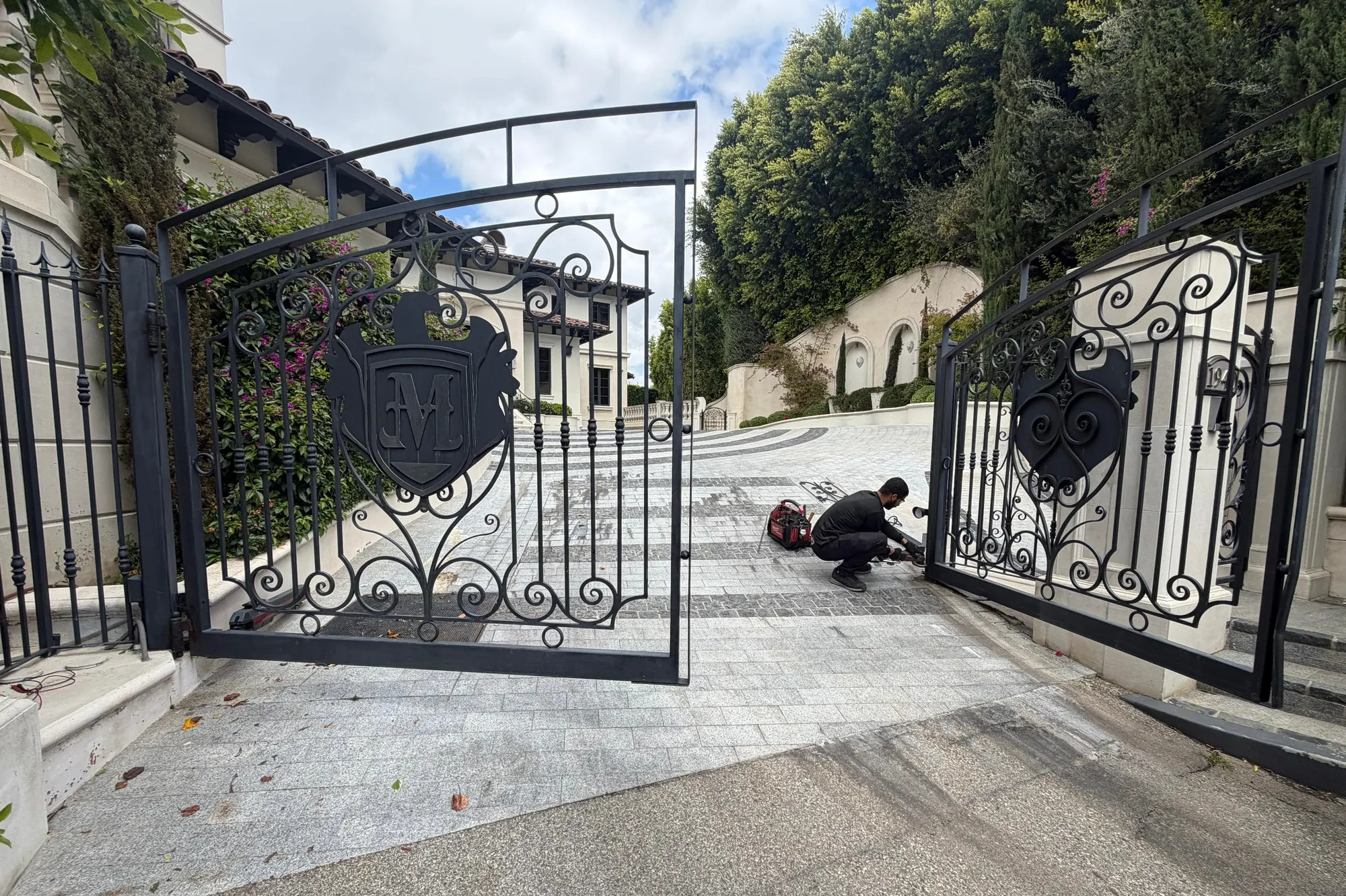 Rust damage at the bottom rail of an iron gate before cutting out and replacing