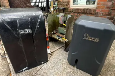 A barrier arm operator installed at a vehicle entrance